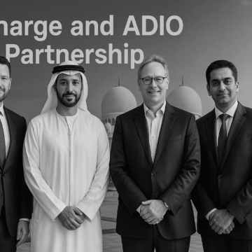 VCharge and ADIO partnership team in Abu Dhabi marking EV manufacturing milestone.